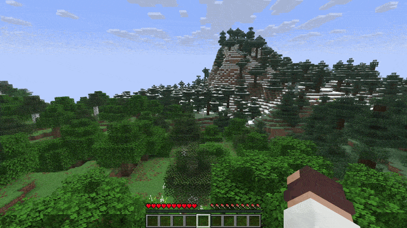 Minecraft forest view with snowy mountains in the distance