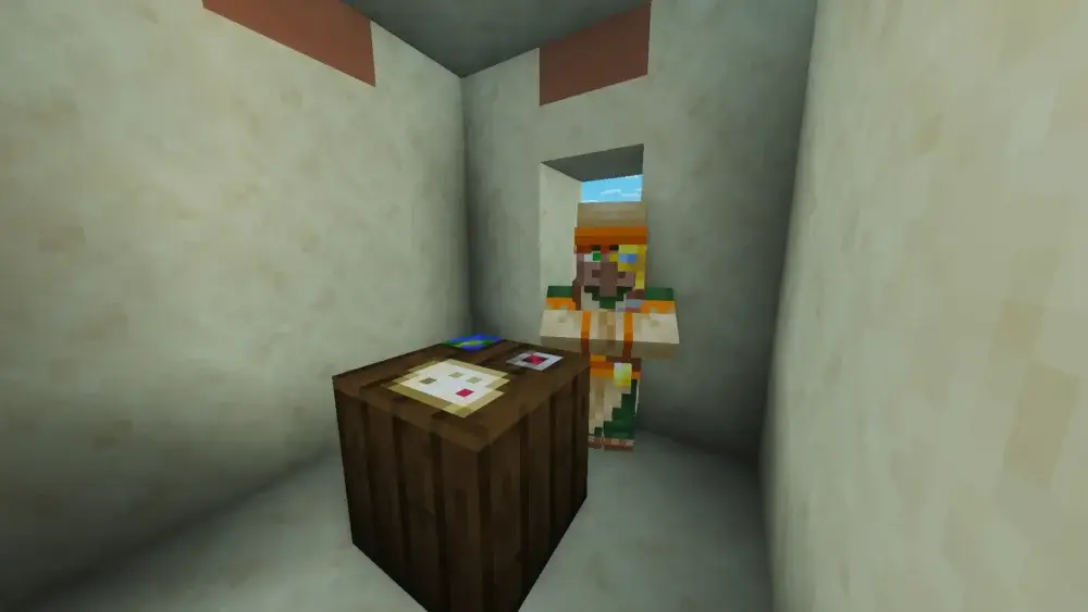 Minecraft Cartographer villager standing next to a cartography table
