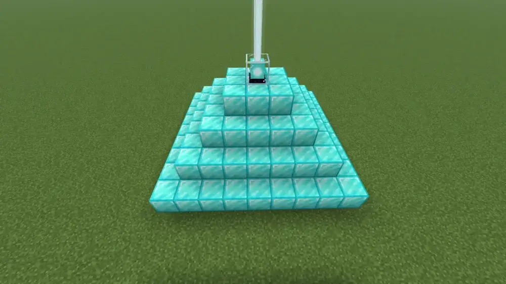 Fully powered Minecraft beacon on a four-tier diamond block pyramid