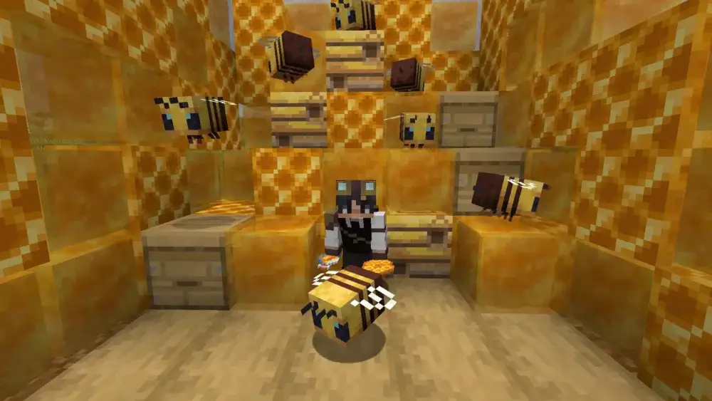 Minecraft player surrounded by bees, beehives, and honey blocks inside a honey-themed room