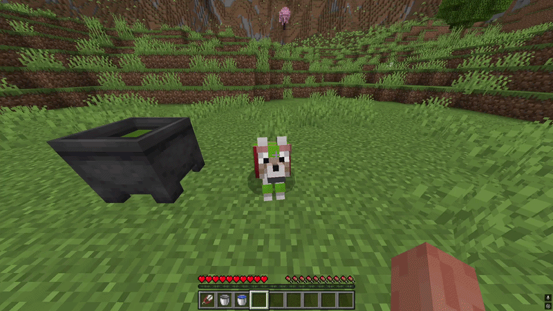 Removing dye from wolf armor with a water-filled cauldron in Minecraft