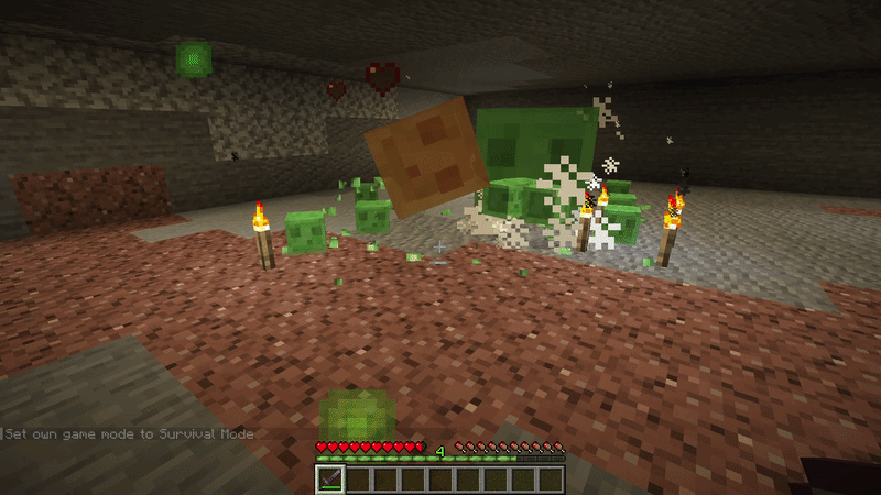 Large Minecraft slime splitting into smaller slimes after being defeated